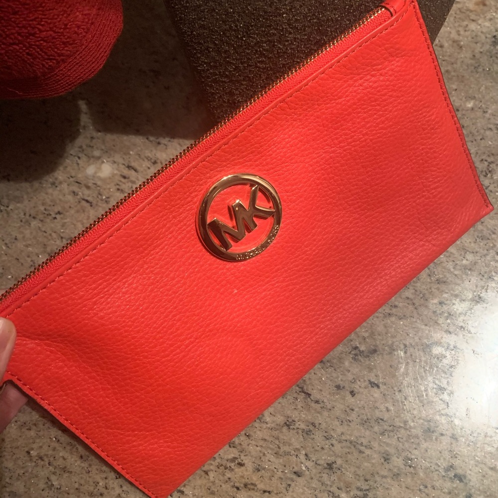 Orange Michael Kors clutch